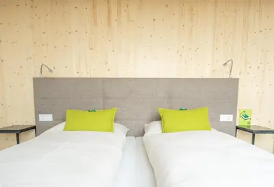 Ein Bett oder Betten in einem Zimmer der Unterkunft eee Hotel Eberstalzell