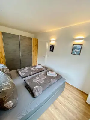 Ein Bett oder Betten in einem Zimmer der Unterkunft Siriuskogel im Zentrum von Bad Ischl