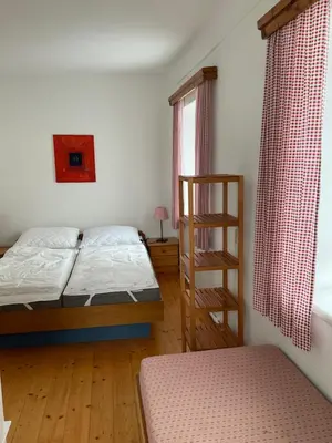 Ein Bett oder Betten in einem Zimmer der Unterkunft Steiner Stammhaus