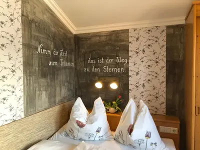 Ein Bett oder Betten in einem Zimmer der Unterkunft Appartement Zechmann Rohrmoos