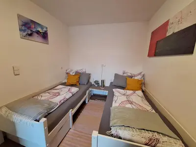 Ein Bett oder Betten in einem Zimmer der Unterkunft Hexenhäuschen