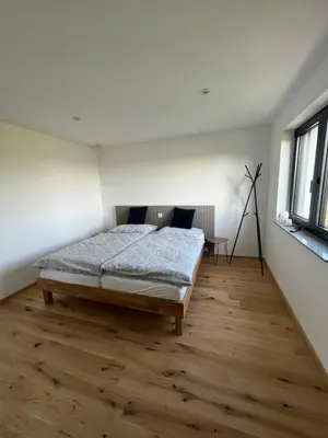 Ein Bett oder Betten in einem Zimmer der Unterkunft Grünberg Apartments