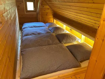 Ein Bett oder Betten in einem Zimmer der Unterkunft Jörgenbauerhütte