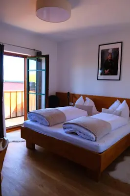 Ein Bett oder Betten in einem Zimmer der Unterkunft Gmundnerberghaus - ROOMS