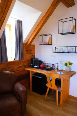 Ein Sitzbereich in der Unterkunft Gmundnerberghaus - ROOMS
