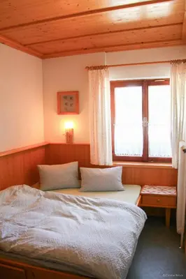 Ein Bett oder Betten in einem Zimmer der Unterkunft Apartment Bleisch