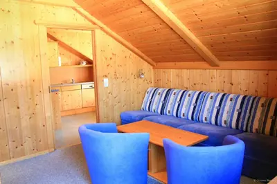 Ein Sitzbereich in der Unterkunft Apartment Bleisch