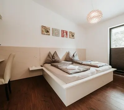 Ein Bett oder Betten in einem Zimmer der Unterkunft Haus Sommerfrische