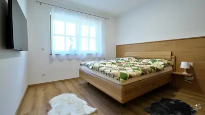 Ein Bett oder Betten in einem Zimmer der Unterkunft Landhaus Seppenbauer