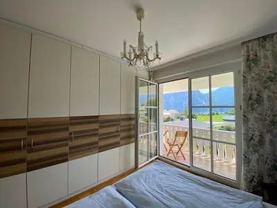 Ein Bett oder Betten in einem Zimmer der Unterkunft Luxury-Suites Traunsee