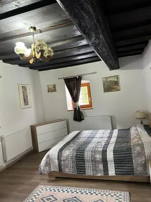 Ein Bett oder Betten in einem Zimmer der Unterkunft Blue House