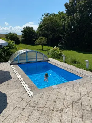 Der Swimmingpool an oder in der Nähe von Gemütliches Haus in Seewalchen am Attersee