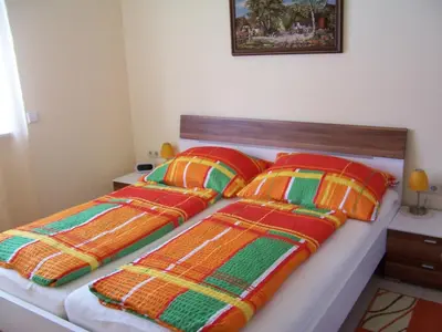 Ein Bett oder Betten in einem Zimmer der Unterkunft LANDHAUS JASMIN ausgezeichnet mit 4 Kristallen - FW Grimmingblick