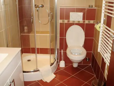 Ein Badezimmer in der Unterkunft Apartma mit Seeblick
