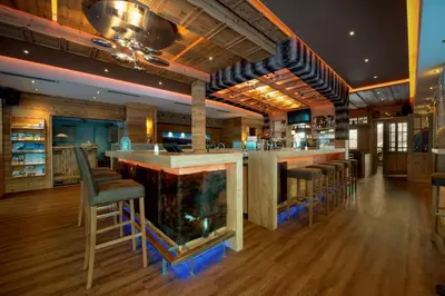 Ein Restaurant oder anderes Speiselokal in der Unterkunft Almresort Baumschlagerberg