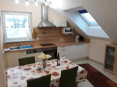 Küche/Küchenzeile in der Unterkunft LANDHAUS JASMIN ausgezeichnet mit 4 Kristallen - FW Sarsteinblick