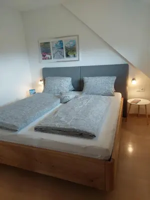 Ein Bett oder Betten in einem Zimmer der Unterkunft Moser Jaggeihof
