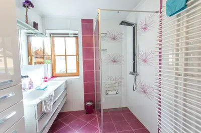 Ein Badezimmer in der Unterkunft Sunshine Aich by Alpenidyll Apartments