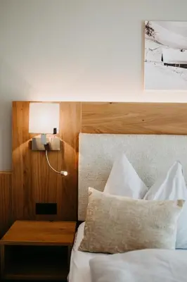 Ein Bett oder Betten in einem Zimmer der Unterkunft Hotel Schützenhof