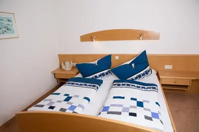Ein Bett oder Betten in einem Zimmer der Unterkunft Lehenriedl Appartements