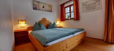 Ein Bett oder Betten in einem Zimmer der Unterkunft Bio-Bauernhof Vorderfromm