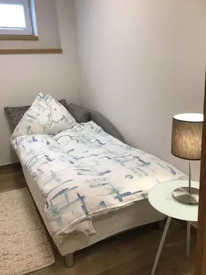 Ein Bett oder Betten in einem Zimmer der Unterkunft Blaue Lagune