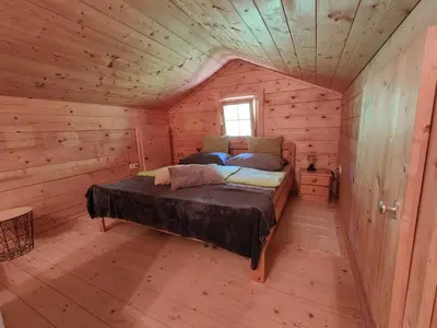 Ein Bett oder Betten in einem Zimmer der Unterkunft Reithütte