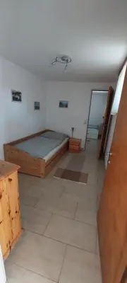 Ein Bett oder Betten in einem Zimmer der Unterkunft Apartment Hüttner