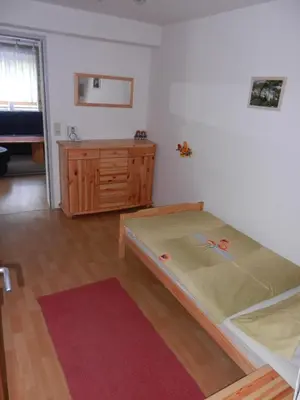 Ein Bett oder Betten in einem Zimmer der Unterkunft Apartment Hüttner