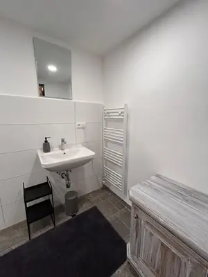 Ein Badezimmer in der Unterkunft Haus Grimmingblick
