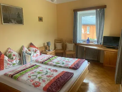Ein Bett oder Betten in einem Zimmer der Unterkunft Wengerwirt zur Laube