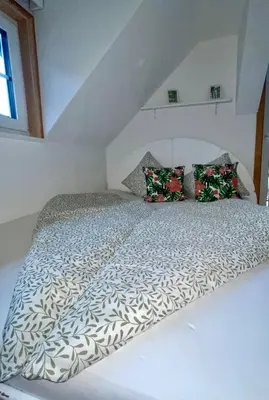 Ein Bett oder Betten in einem Zimmer der Unterkunft Almsternderl 2.0 - gemütliches Appartment in Gosau