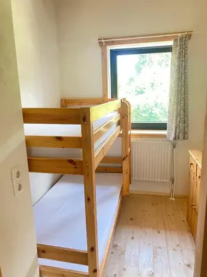 Ein Bett oder Betten in einem Zimmer der Unterkunft Apartment Steinwänd Top 8