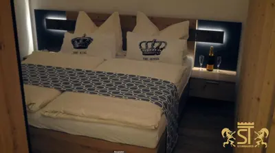 Ein Bett oder Betten in einem Zimmer der Unterkunft Chalet Münsterstadl
