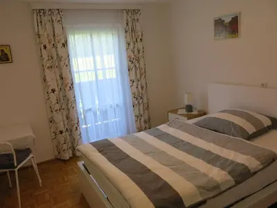 Ein Bett oder Betten in einem Zimmer der Unterkunft Ferienwohnung Marterer