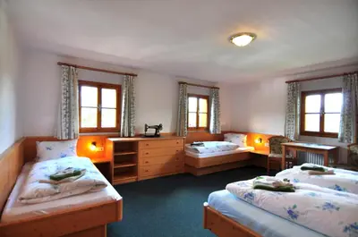 Ein Bett oder Betten in einem Zimmer der Unterkunft Pferdehof Oberegg