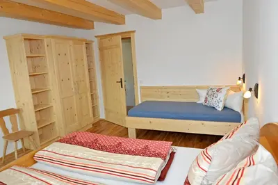 Ein Bett oder Betten in einem Zimmer der Unterkunft Ferienhaus Johanna