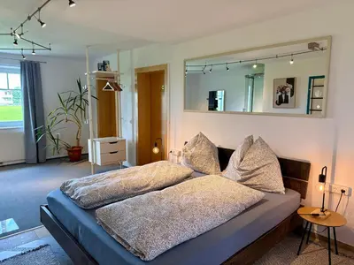Ein Bett oder Betten in einem Zimmer der Unterkunft Traumhaft große Ferienwohnung nähe Attersee