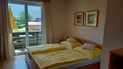 Ein Bett oder Betten in einem Zimmer der Unterkunft Ferienwohnungen Haus Peer