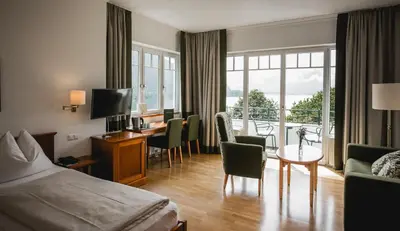 Ein Bett oder Betten in einem Zimmer der Unterkunft Seehotel Billroth