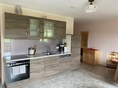 Küche/Küchenzeile in der Unterkunft Maislbauer