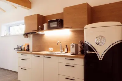 Küche/Küchenzeile in der Unterkunft BachBett - modernes Gästehaus im Salzkammergut