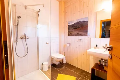 Ein Badezimmer in der Unterkunft Designferienhaus Altenmarkt Zauchensee
