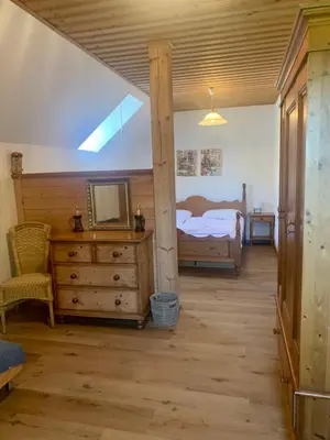 Ein Bett oder Betten in einem Zimmer der Unterkunft Haus Zirbennest