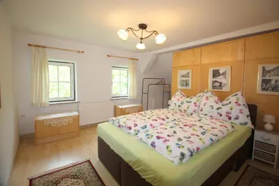 Ein Bett oder Betten in einem Zimmer der Unterkunft Wohnung Rudolf