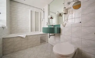 Ein Badezimmer in der Unterkunft Heart Hotel Aurora