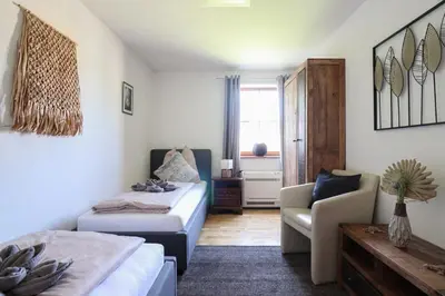 Ein Bett oder Betten in einem Zimmer der Unterkunft Naturtalente Berghaus - Apartment 2