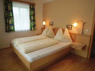 Ein Bett oder Betten in einem Zimmer der Unterkunft Appartements Edda