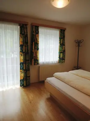 Ein Bett oder Betten in einem Zimmer der Unterkunft Appartements Edda