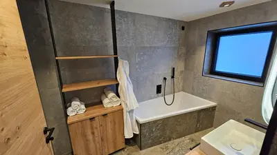 Ein Badezimmer in der Unterkunft Apartment Gosauschmied